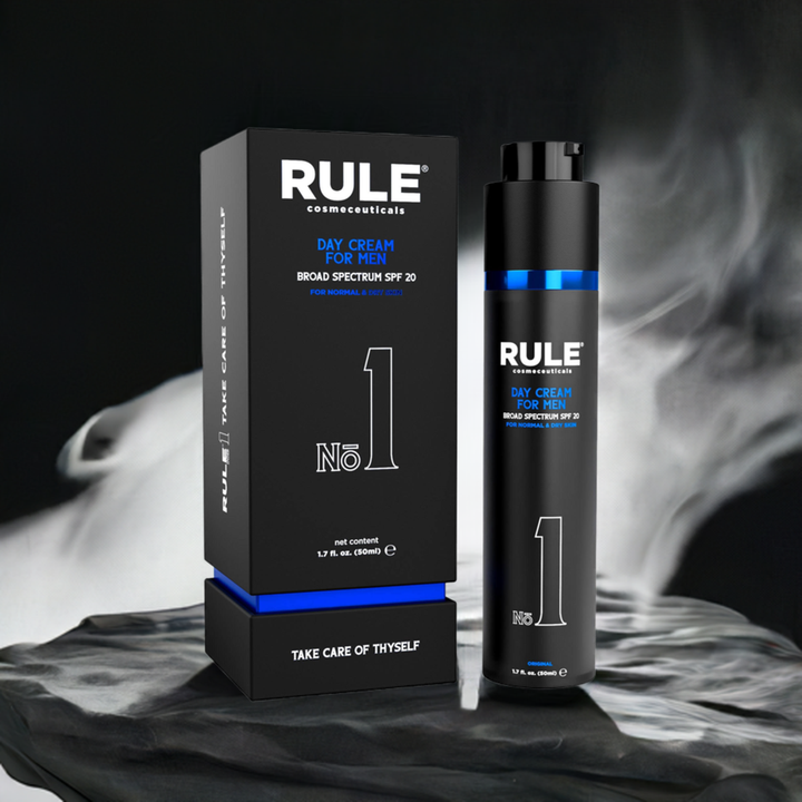 Rule No. 1 All-in-One Day Cream for Men packaging and bottle, highlighted with SPF 20 protection, set against a smooth, smoky background, emphasizing its premium and sophisticated design.