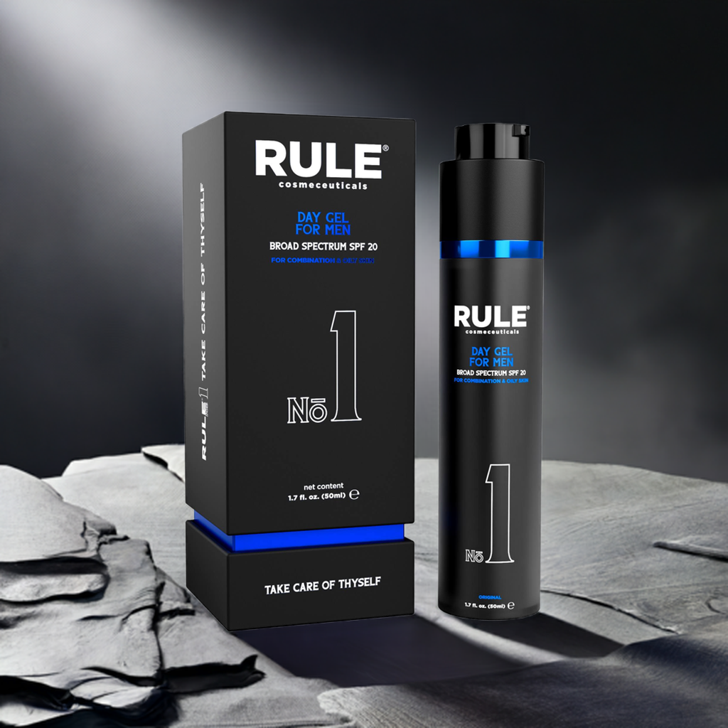 Rule No. 1 Day Gel for Men packaging and bottle, designed for combination and oily skin with SPF 20 protection, displayed on a sleek stone surface with soft shadowed lighting, emphasizing its contemporary and premium aesthetic.