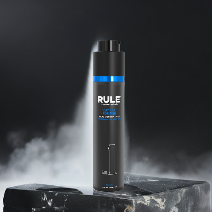 Rule No. 1 Day Gel for Men bottle, designed for combination and oily skin, featuring SPF 20 protection, displayed under a focused spotlight with a misty, dark background for a bold and refined look.