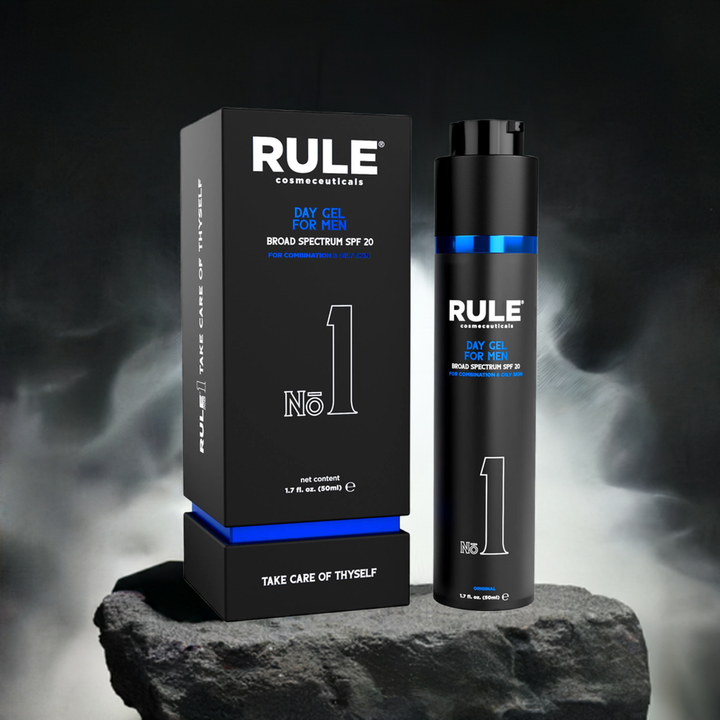 Rule No. 1 Day Gel for Men packaging and bottle, featuring SPF 20 protection for combination and oily skin, displayed on a rugged stone surface with a sleek smoky background, highlighting its modern and powerful design.