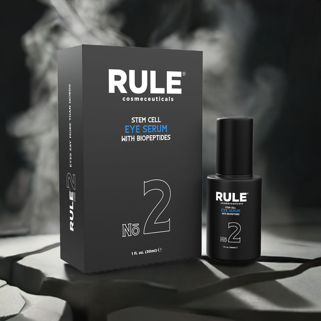 Rule No. 2 Stem Cell Eye Serum packaging and bottle, enriched with biopeptides for advanced skincare, displayed on a sleek surface with a smoky, elegant backdrop, highlighting its premium and targeted eye care benefits.